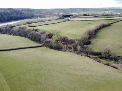 ADJOINING LAND